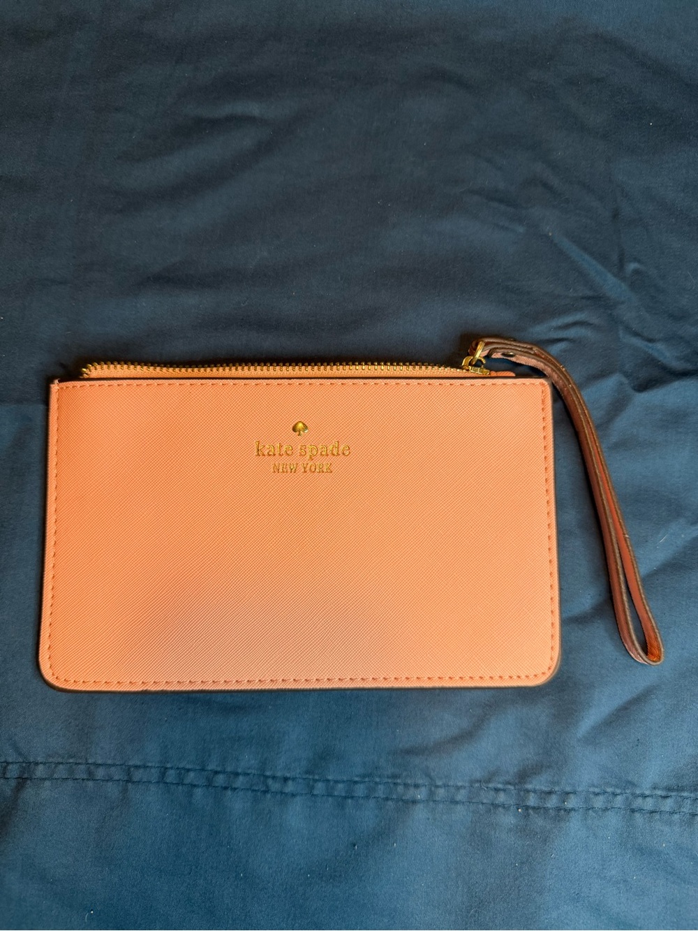 kate spade Coral Leather Wristlet with Gold Logo